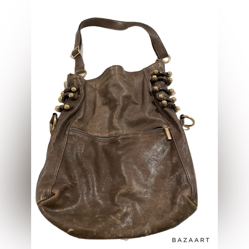 SHIH asymmetrical brown leather bag. Shoulder strap has 2 locations. B6